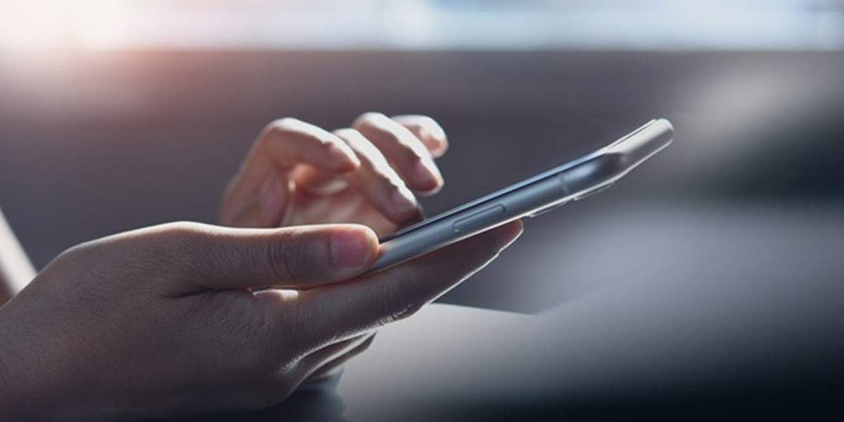 Woman's hands on smartphone