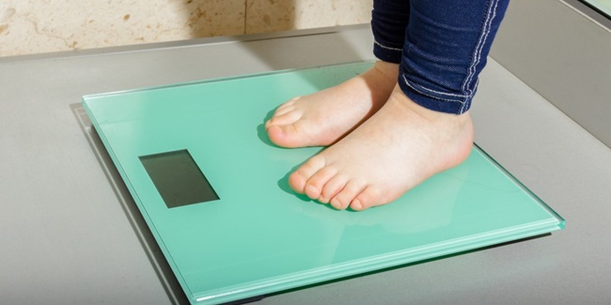 Child's feet on scales
