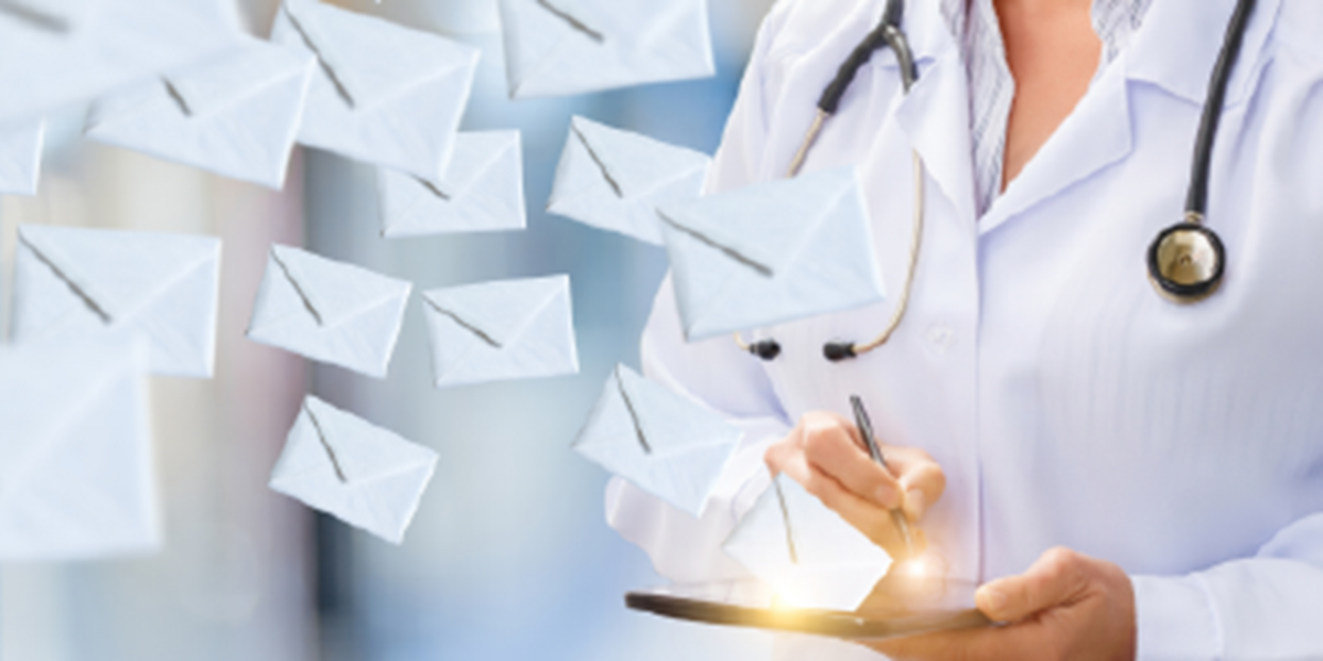 Doctor with email icons